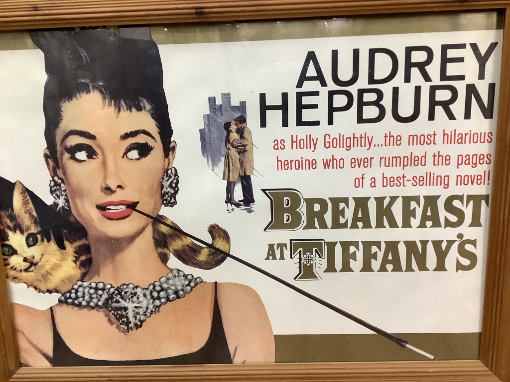 Two framed film posters: Breakfast and Tiffanys and Gone with The Wind